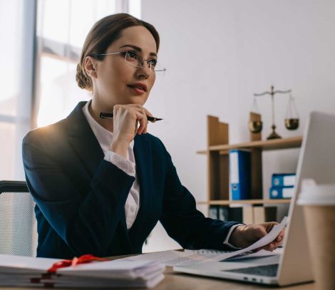 female-lawyer-in-eyeglasses-at-workplace-with-docu-2021-08-29-21-19-57-utc